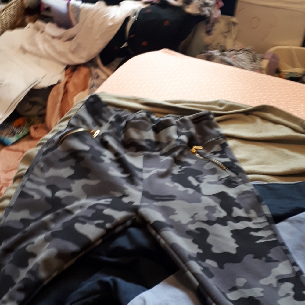 Camo pants with gold zippers